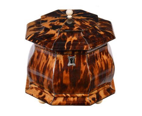 Y  A late Regency or George IV tortoiseshell veneered, ivory mounted and metal strung octagonal tea caddy, circa 1820, of bom