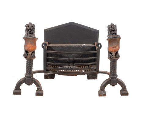 A Victorian wrought and cast iron and copper mounted fire grate, last quarter 19th century, the arched rectangular section ba