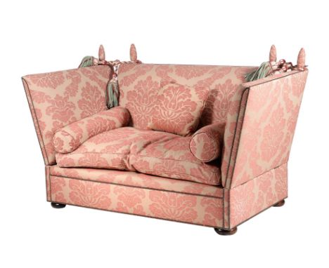 An upholstered Knole sofa, recently manufactured by George Smith, labelled for the maker to the underside of the frame, with 