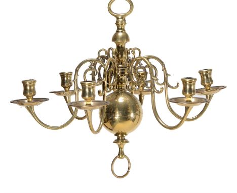 A matched pair of six light brass chandeliers, in 17th century Dutch style, late 19th/early 20th century, one 43cm high and a
