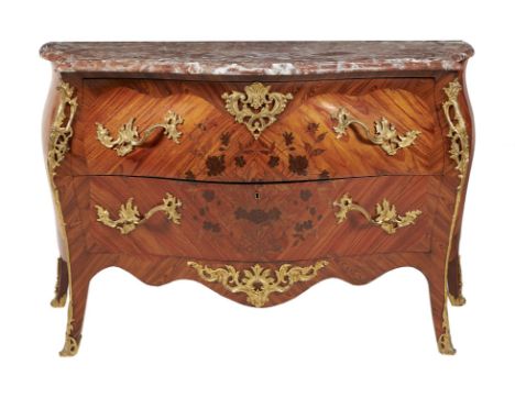 Y A kingwood, tulipwood inlaid, and gilt metal mounted commode in Louis XV style, first half 20th century, of bombe outline, 