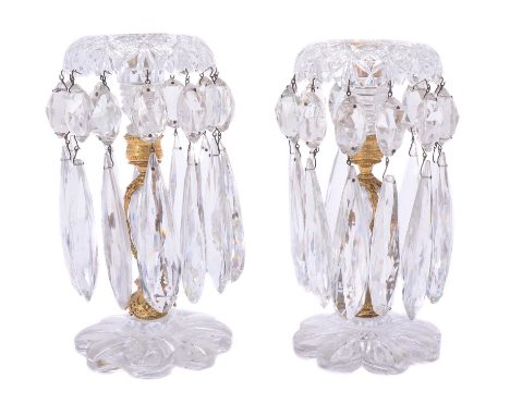 A pair of cut and moulded clear glass and gilt metal mounted lustre candlesticks, possibly Northern Europe, third quarter 19t