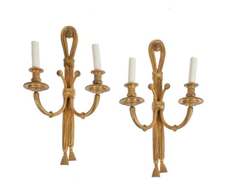 A set of four gilt bronze twin light wall appliques in Louis XVI style, 20th century, each with twin scrolled arms issuing fr