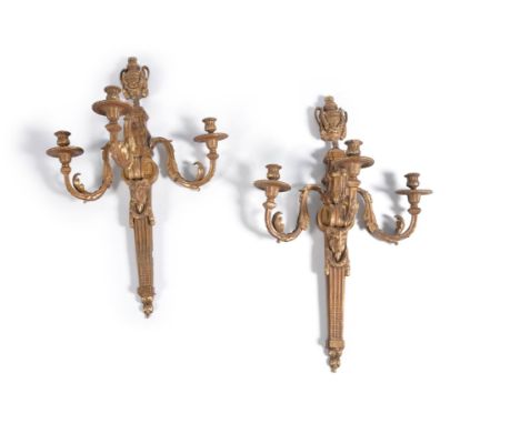 A pair of substantial French gilt composition three light wall appliqués in Louis XVI style, 20th century, in the manner of e