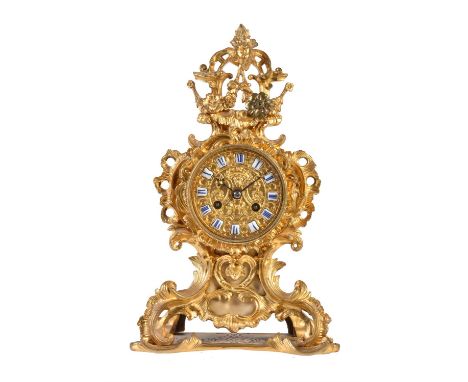 A French gilt metal mantel clock, Raingo Freres, Paris, late 19th century, the eight day bell striking movement with outside 
