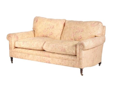 A stained beech and upholstered two-seat sofa, recently manufactured by George Smith, after the manner of Howard & Sons, labe