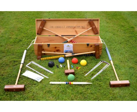 A part croquet set, recently manufactured by Wood Mallets, New Zealand, comprising six mallets, stamped 3.00 and each with a 