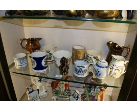 A COLLECTION OF POTTERY to include two lustre jugs, a caneware frog mug, a pair of coursing mugs, one other frog mug, a pearl