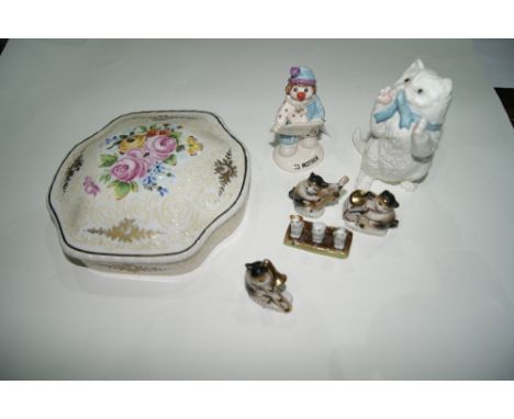 A ROYAL WORCESTER PORCELAIN CAT 12cm in height, a Beswick clown, four small porcelain cat models, a French porcelain dish cov