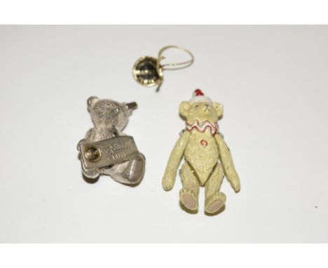 A MODEL TEDDY BEAR from The Steiff Club 1994-1995, together with a further silver plated Steiff Club teddy bear brooch