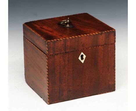 A GEORGE III MAHOGANY SQUARE TEA CADDY with ivory escutcheon, 13cm across