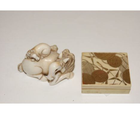 A JAPANESE IVORY SMALL BOX with lantern design to the top and an ivory netsuke in the form of a horse and foal (2)