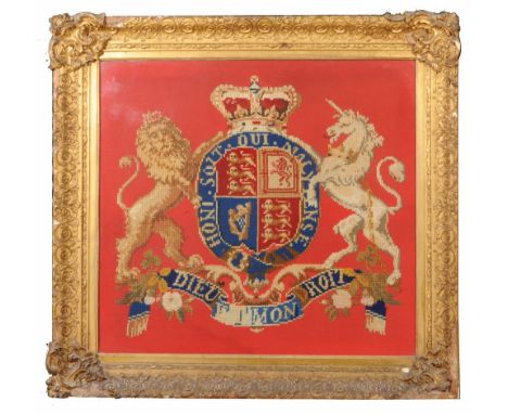 A woolwork tapestry picture of the Royal Coat of Arms, 62 x 68cm