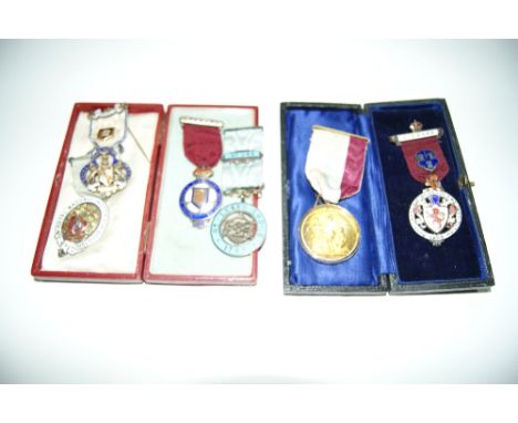 A COLLECTION OF SIX MASONIC MEDALS and badges with enamel decoration including one in 14ct gold frame