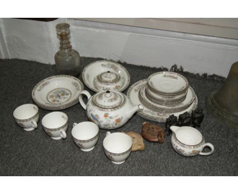 A WEDGWOOD 'KUTANI CRANE' PART BREAKFAST SET, two Roman style pottery lamps, a glass decanter and three carved figures