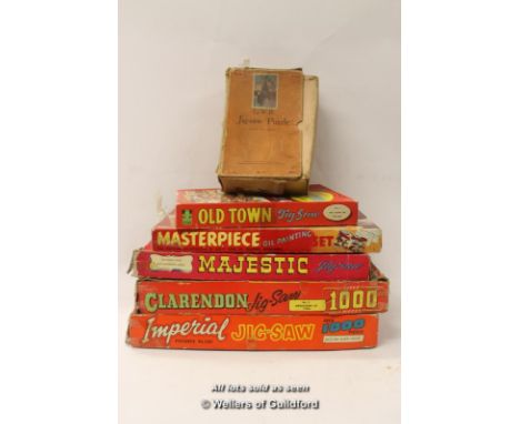 Assorted puzzles including G.W.R. by Chad Valley and a vintage oil painting set (6)