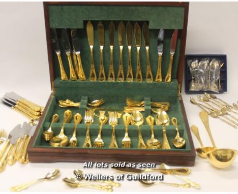 A modern Solignen canteen of gold plated cutlery; a boxed set of six gold coloured spoons.