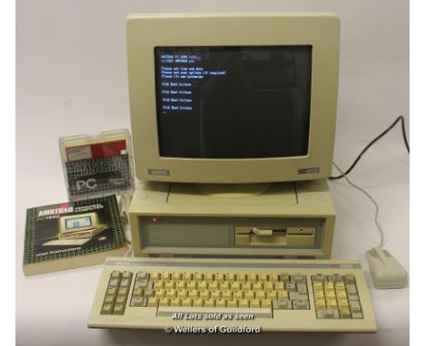 Retro computing: Amstrad PC1640 SD computer and PC-ECD monitor with mouse, keyboard, software floppy disc and manual, both wi