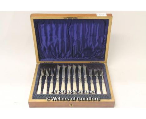 *A twelve piece set of silver and mother of pearl cutlery (Lot subject to VAT) (LQD98)