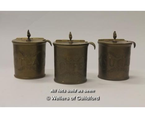 A set of three small decorative brass tea, coffee and sugar pots, with hinged lids and ladles