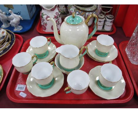 Royal Albert Coffee Service, of fifteen pieces, green lower bodies, gilt bands on cream grounds '1309' to cups:- One Tray.