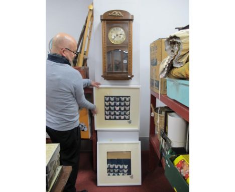 An Oak Regulator Wall Clock, two butterfly model montages by Sue Gorman.