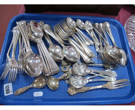 Silver Caddy Spoon, Sheffield hallmark, another plated, beadwork and other cutlery:- One Tray