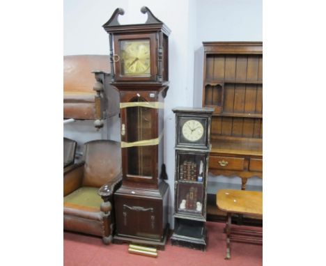 A Black Painted Miniature Longcase Clock, with a white dial, glazed door, with books and Staffordshire dogs, shaped base, tog