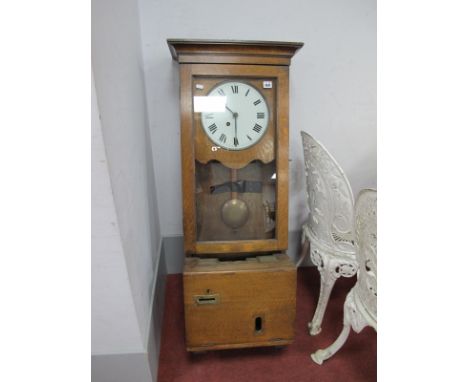 An Early National Time Recorder Oak Factory Clocking-In Machine, working clock with original winding key and key to cabinet (