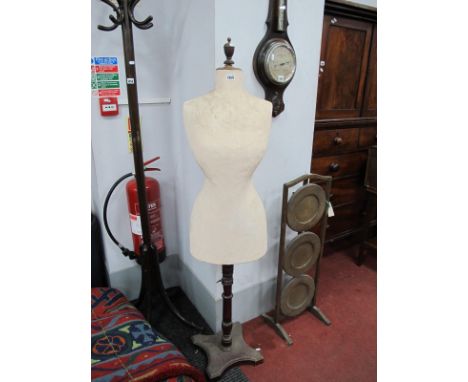 A Plaster Mannequin, on a mahogany pedestal base, 153cm high.