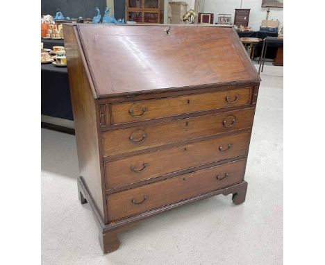 Georgian mahogany bureau, the hinged fall front enclosing a divided stationary interior with drawers, over four long graduate