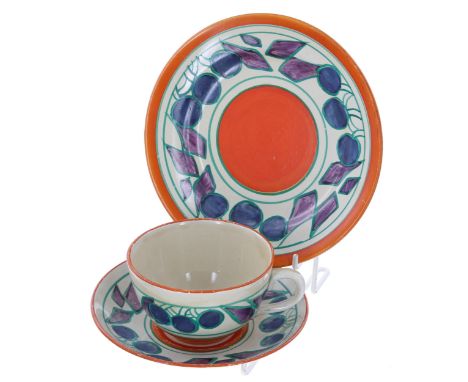 Clarice Cliff Fantasque 'Cherry' trio retailed by Lawley's, comprising a tea cup, saucer and side plate,&nbsp;with gold backs