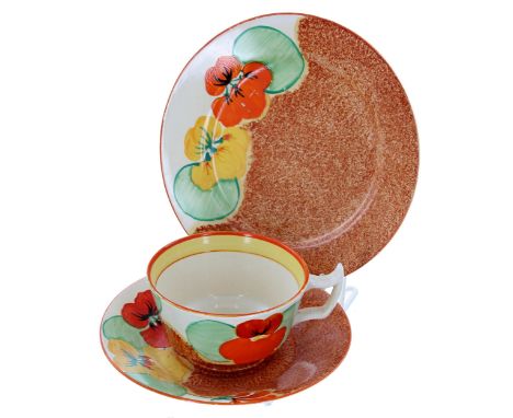 Clarice Cliff Bizarre 'Nasturtium' trio, comprising a tea cup, saucer and side plate, the side&nbsp;plate 6.5" diameter 