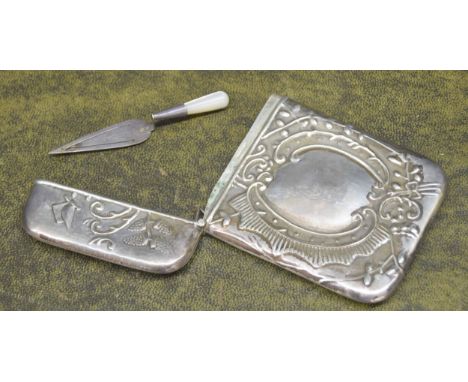 Repousse silver card case, with a spring hinged cover, maker Ari D Norman, London 1993, 4" x 2.75", 2.7oz t; together with a 