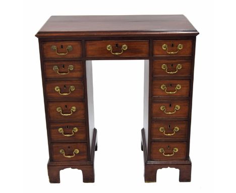 Unusual Georgian tall mahogany pedestal estate desk,&nbsp;the moulded top over single kneehole freeze drawer flanked by banks