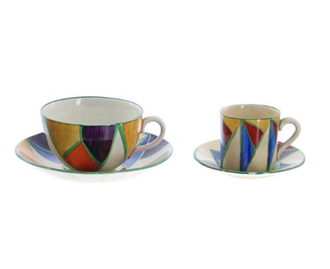 Clarice Cliff 'Original&nbsp;Bizarre' globe tea cup and saucer,&nbsp;with a printed gold backstamp, the saucer 5.5" diameter;