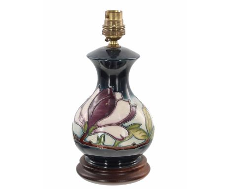 Moorcroft Pottery 'Wine Magnolia' table lamp, mounted upon a wooden base, 9.5" high including fitting 