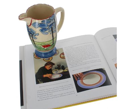 Clarice Cliff Wilkinson Coronet jug, hand painted in the 'Blue Firs' pattern by former paintress and 'Bizarre' girl Marjory H