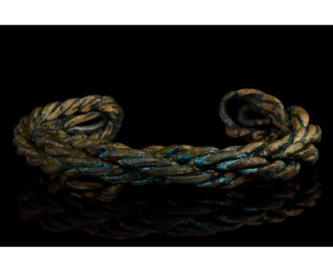 Ca. 900-1100 AD. Early Medieval. A beautiful Viking-inspired twisted 'fealty' bracelet or arm ring. Good condition; beautiful