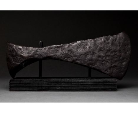 Ca. 1000-1200 AD. Viking Age. An iron axe head comprising a short, curved blade, elongated cheek, lozenge-shaped poll, and ro