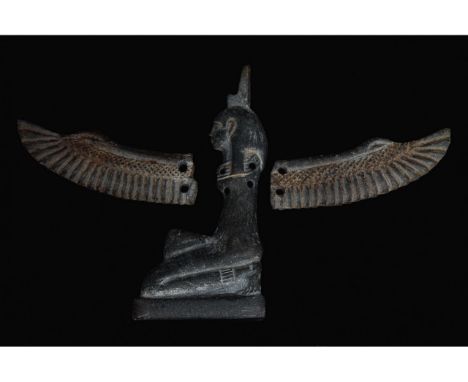 Ca. 664-30 BC. Late Period - Ptolemaic Dynasty or later. A black inlay of the goddess Isis. She is depicted in profile, kneel