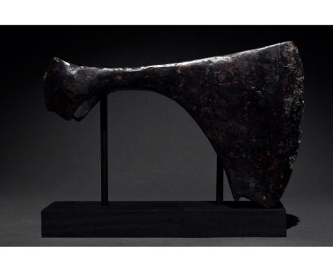 Ca. 900-1100 AD. Viking. An impressive iron axehead with a curved blade and elliptical shaft-hole. The profile is square at t