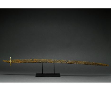 Ca. 400-600 AD. Migration Period. A long iron sword with a long, pointed, bevelled blade, a rectangular guard and a rectangul