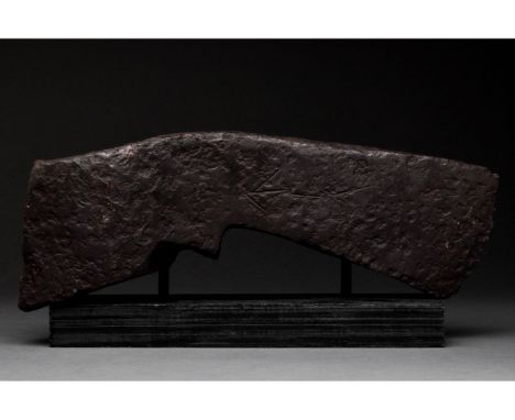 Ca. 1000-1200 AD. Viking Age. An iron battle axe with a short, curved blade, arched cheek, heavy, and heavy poll. An incised 