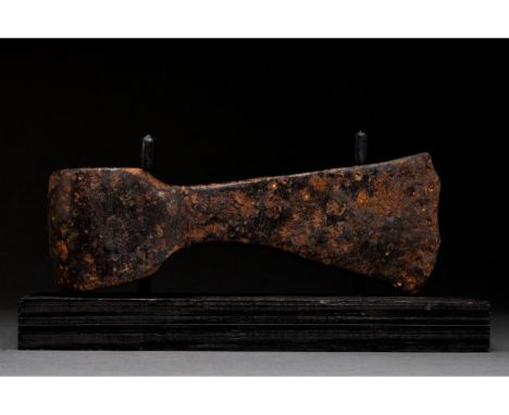 Ca. 1000-1200 AD. Viking Age. An iron axe head comprising a short, curved blade, elongated cheek, lozenge-shaped poll and rou