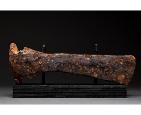 Ca. 1000-1200 AD. Viking Age. An iron axe head comprising a short, curved blade, elongated cheek, lozenge-shaped poll and rou