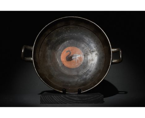 Ca. 520-450 BC. Greek Attic. A beautiful black-figure Attic kylix, i.e. a wide-bowled drinking cup with a large, black glazed