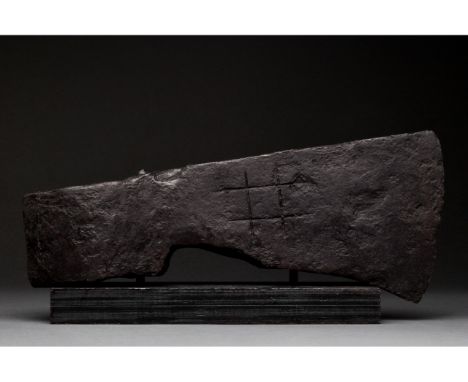 Ca. 1000-1200 AD. Viking Age. An iron battle axe with a short, curved blade, arched cheek, and heavy, reinforced poll. The ch
