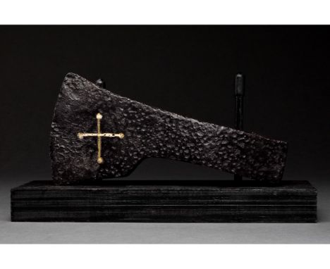 Ca. 1000-1200 AD. Medieval Western Europe/Viking. An iron axe head with a curved blade, triangular cheek, elliptical shaft-ho
