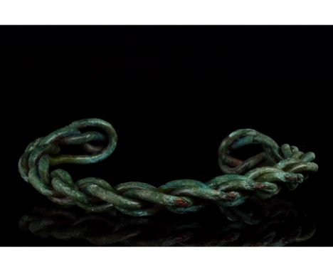 Ca. 900-1100 AD. Early Medieval. A beautiful Viking-inspired twisted 'fealty' bracelet or arm ring. Good Condition. Beautiful